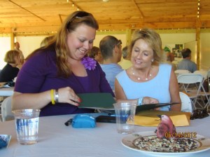 Archer’s Green Property Manager Jennifer Hewett (left) and Signature Management Vice President Kathy Scott at the 2012 Environmental Action Awards, July 15, 2012 at the Norfolk Zoo. 