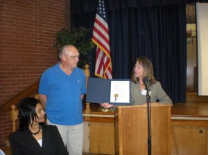 Norfolk Police Crossing Guard Mike Waldron receives a certificate of appreciation from the Mayor at a special civic league meeting on May 11, 2009. If you’ve driven Thole Street mornings or afternoons on school days, you’ve seen his conscientious effort to get our kids safely to and from school. Slowing and stopping traffic at peak driving times is not an easy task.  Mike’s word of caution for Thole Street drivers is slow down and watch out for our children.